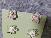 메리모티브(MERRYMOTIVE) Silver line double flower knit earring 후기