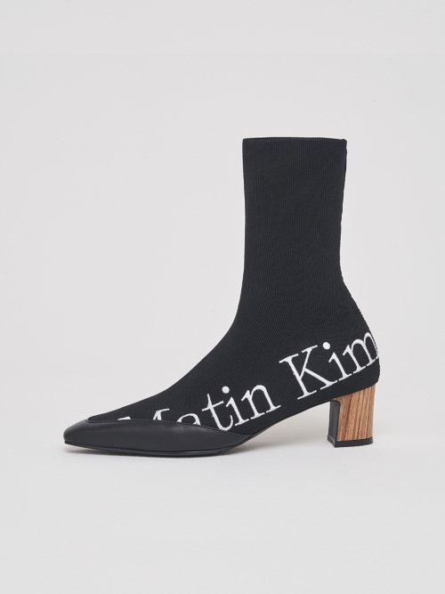 MUSINSA MATIN KIM LOGO KNITTED ANKLE BOOTS IN BLACK