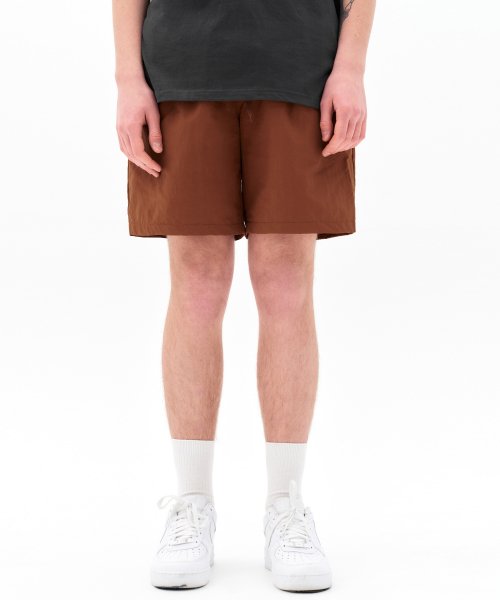 세컨모놀로그(secondmonolgue) 에센셜 나일론 쿨 쇼츠 브릭 오렌지