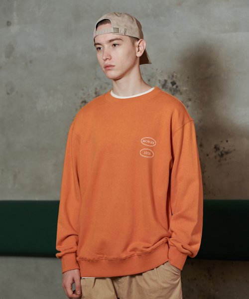 모블러(MOBLER) 호텔 엠블럼 맨투맨 [오렌지] - 41,300원 | 무신사 스토어