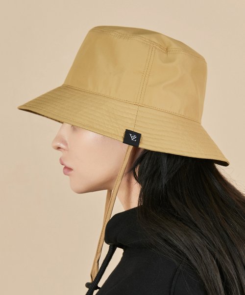 Beige bucket store hat with string