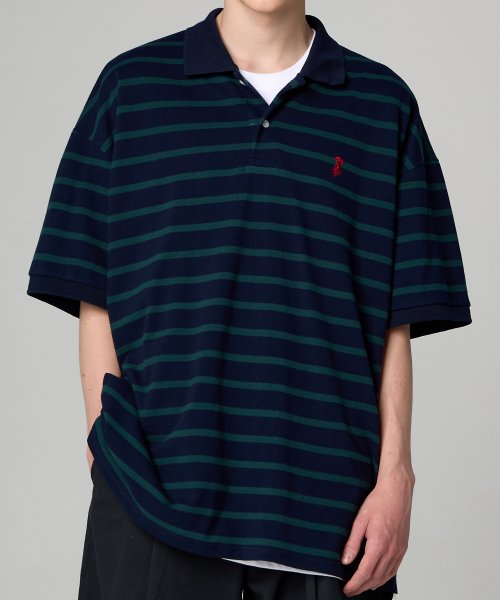 green and black striped polo shirt