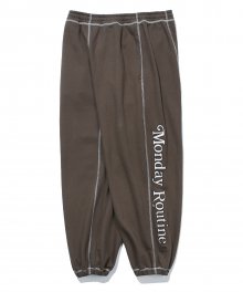 OVER FIT COVER STITCH SWEAT PANTS BROWN