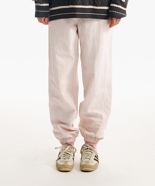 MUSINSA  KIRSH Doodle Cherry Stitch Woven Jogger Pants [Light Beige]