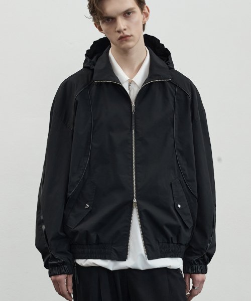 MUSINSA | ALYSS Curved Line Varsity Windbreaker Jacket [Solid Black]