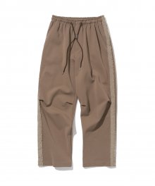 23ss molesey track pants copper
