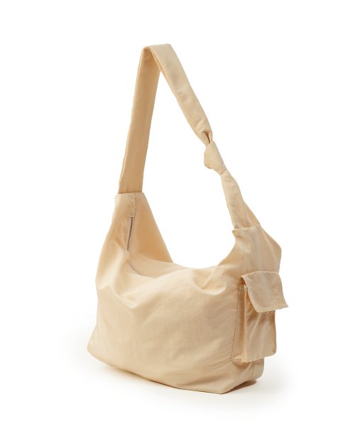 Cream messenger sales bag