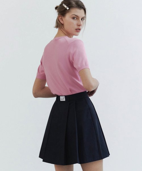 Short navy pleated on sale skirt