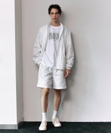 MOUVEMENT NYLON GLOSSY SHORTS off white