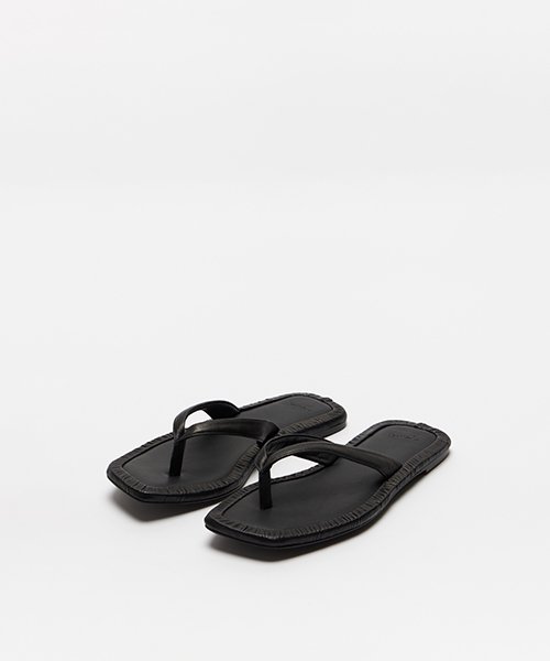 black leather flip flops