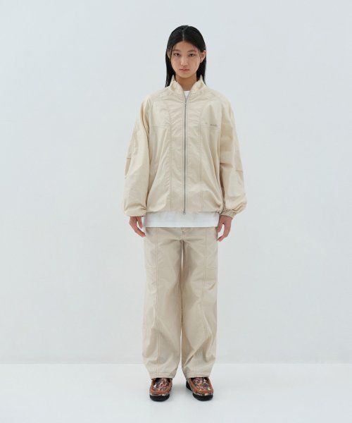 오아이오아이 컬렉션() 레이어드 로고 유광 코팅 팬츠_아이보리 상품 이미지