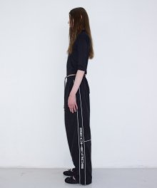 PIPING LINED NYLON PANTS BLACK