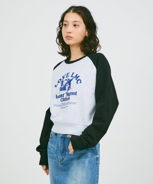 엘엠씨(LMC) WM LOVE ANGEL RAGLAN CROPPED SWEATSHIRT black