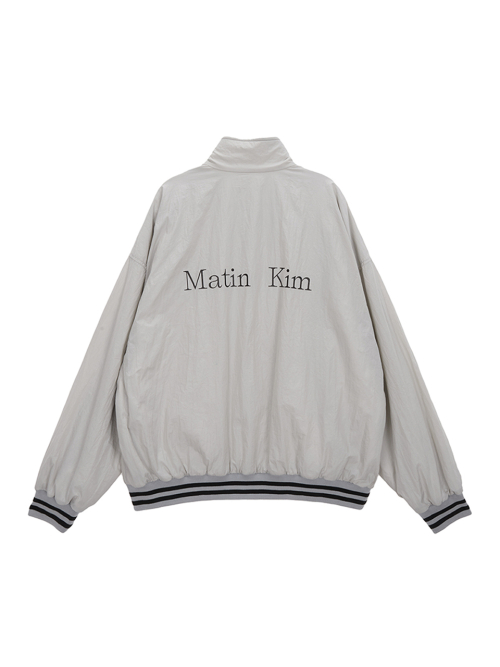 MUSINSA | MATIN KIM REVERSIBLE COATING TRACK JUMPER IN GRAY