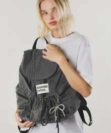 String flap backpack _ Check  Dark gray