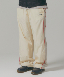 RACING TRACK PANTS cream