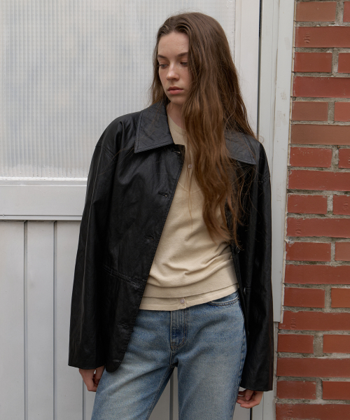 A FAUX LEATHER JACKET