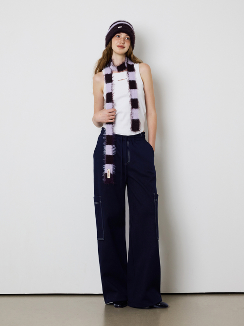 CURVE CUTTING SLEEVELESS TOP - WHITE
