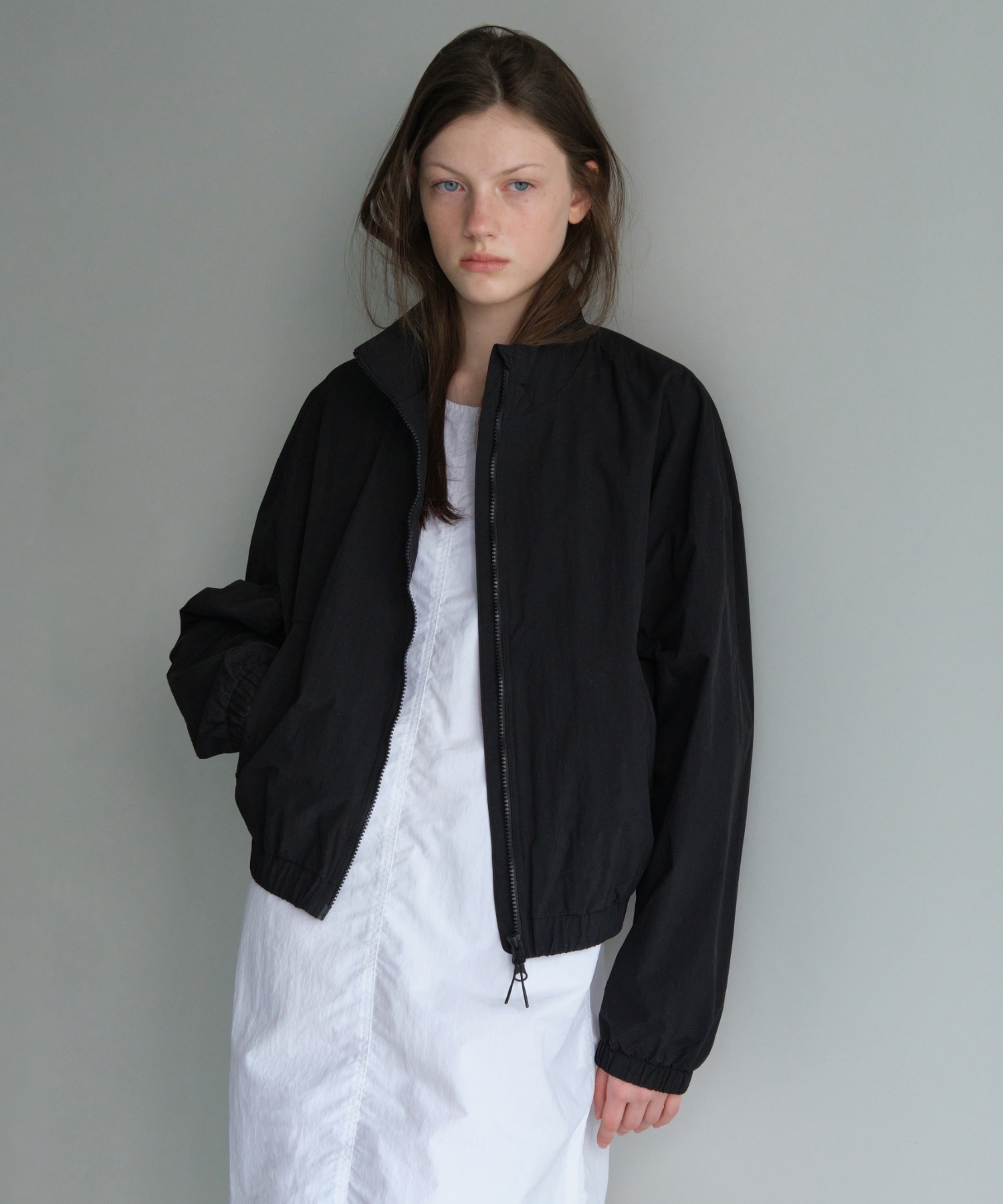 WOMENS OVERSIZE HIGHNECK WINDBREAKER JACKET [BLACK]