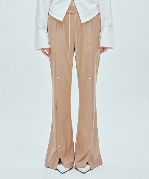 Rivet широкие расклешённые слаксы на резинке Beige