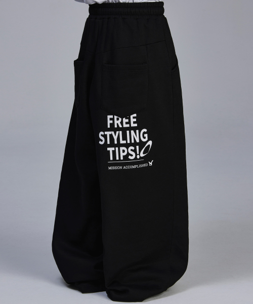 스켈리웩() 백 프린팅 와이드 기모 트레이닝 팬츠[블랙] 상품 이미지