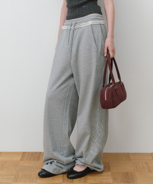 STITCH LOGO CURVED SWEAT PANTS MELANGE GRAY