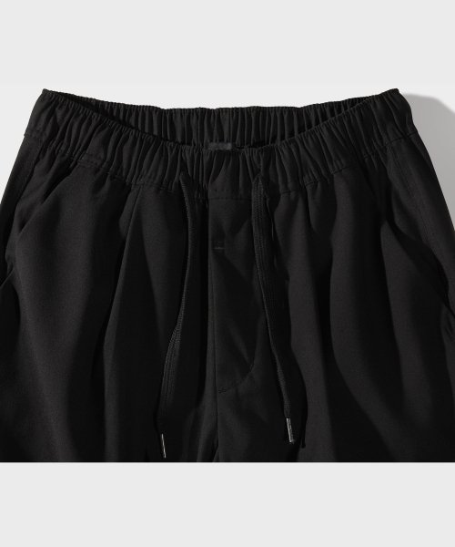 Свободные брюки на резинке с защипом (Black)