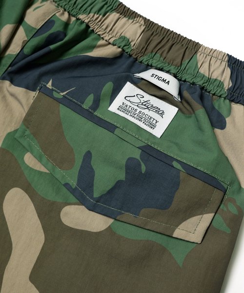 23 CAMO CARGO PANTS WOODLAND – STIGMA GLOBAL