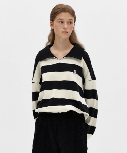 Black sweatshirt with store white stripes on sleeves