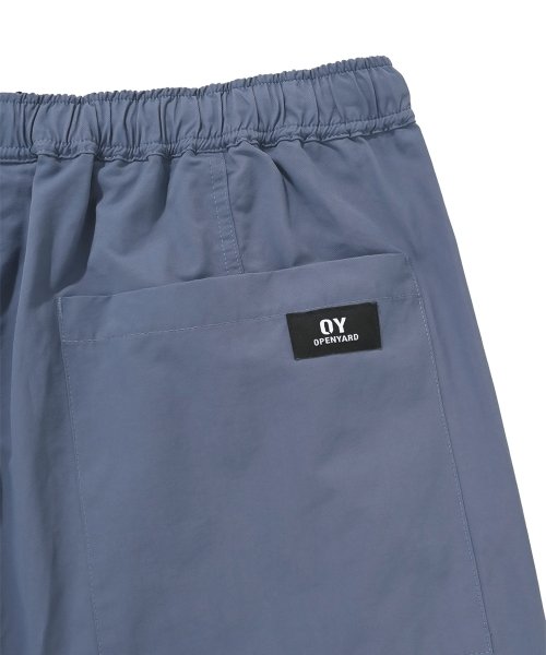 オーワイ(OY) STRING POCKET TRACK PANTS-STONE BLUE – UNDERSTUDY CLUB