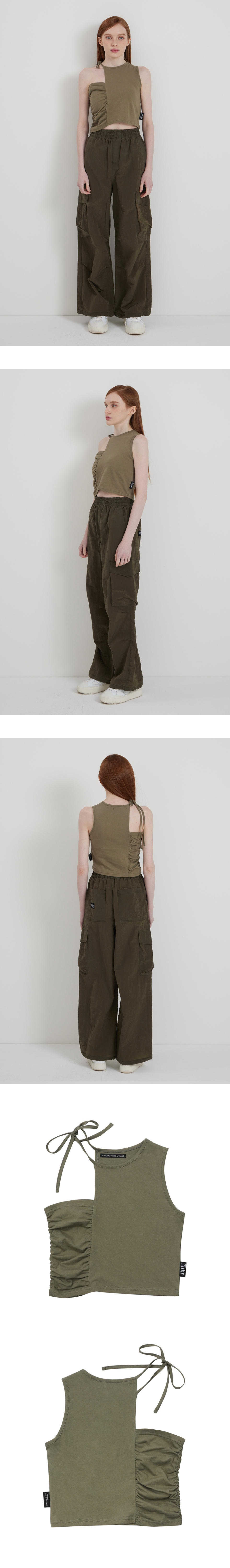 SHIRRING CUT SLEEVELESS  - INFORMATION Material : 100% COTTON Product : KOREA Please refer to the detail cut for specific color.  - SIZE GUIDE S : Length 39 / Shoulder 29 / Chest 38 M : Length 39.5 / Shoulder 30 / Chest 40 Depending on the measurement location and individual, there may be a difference of 1-2 cm. (Unit : cm)  - Model Fitting Size S / Model's Height 178 / Chest 79 / Waist 56 / Hip 86  - LAUNDRY TIP Turn inside out and hand wash with cold water. Please refer to the laundry label for details.