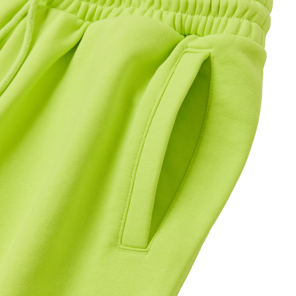 MUSINSA | NERDY Vertical Logo Sweatpants Lime