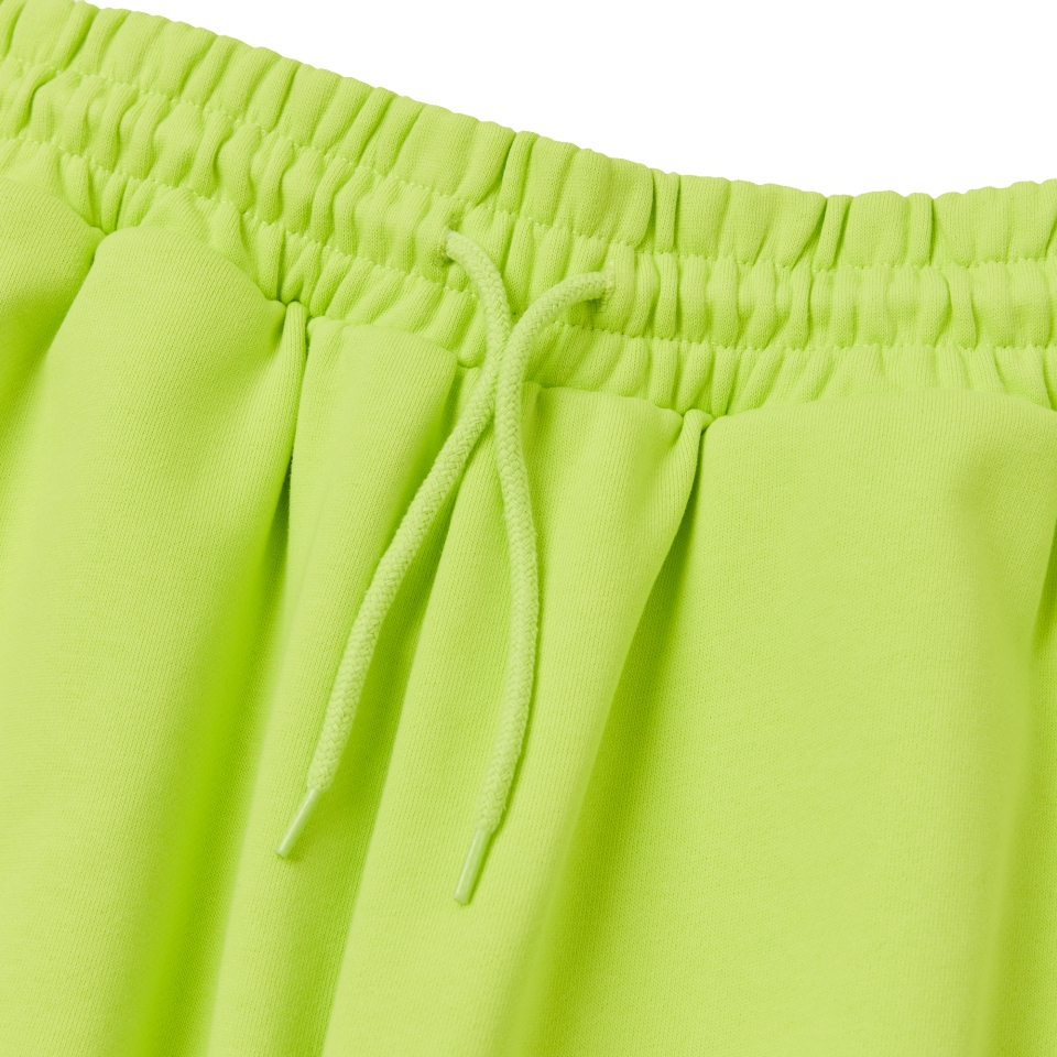 MUSINSA | NERDY Vertical Logo Sweatpants Lime