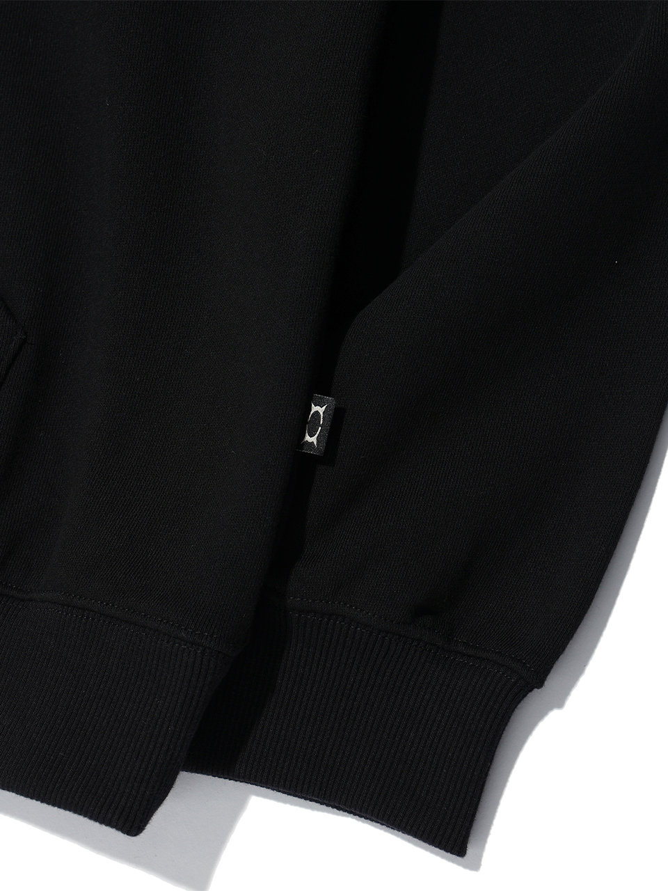 MUSINSA | CRITIC WORMHOLE STUD HOODIE BLACK