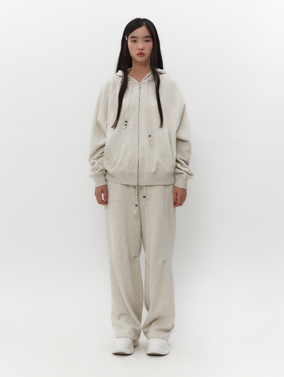 MUSINSA | TUOMIO STRING CHARM SWEATPANTS [OATMEAL]