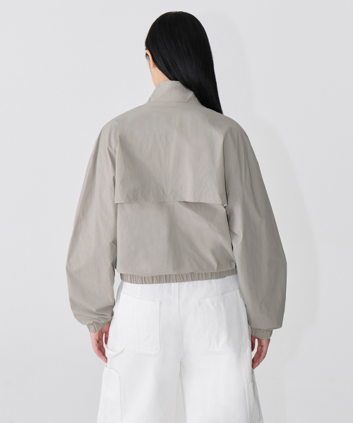 WOMENS OVERSIZE HIGHNECK WINDBREAKER JACKET [LIGHT WARM GREY]