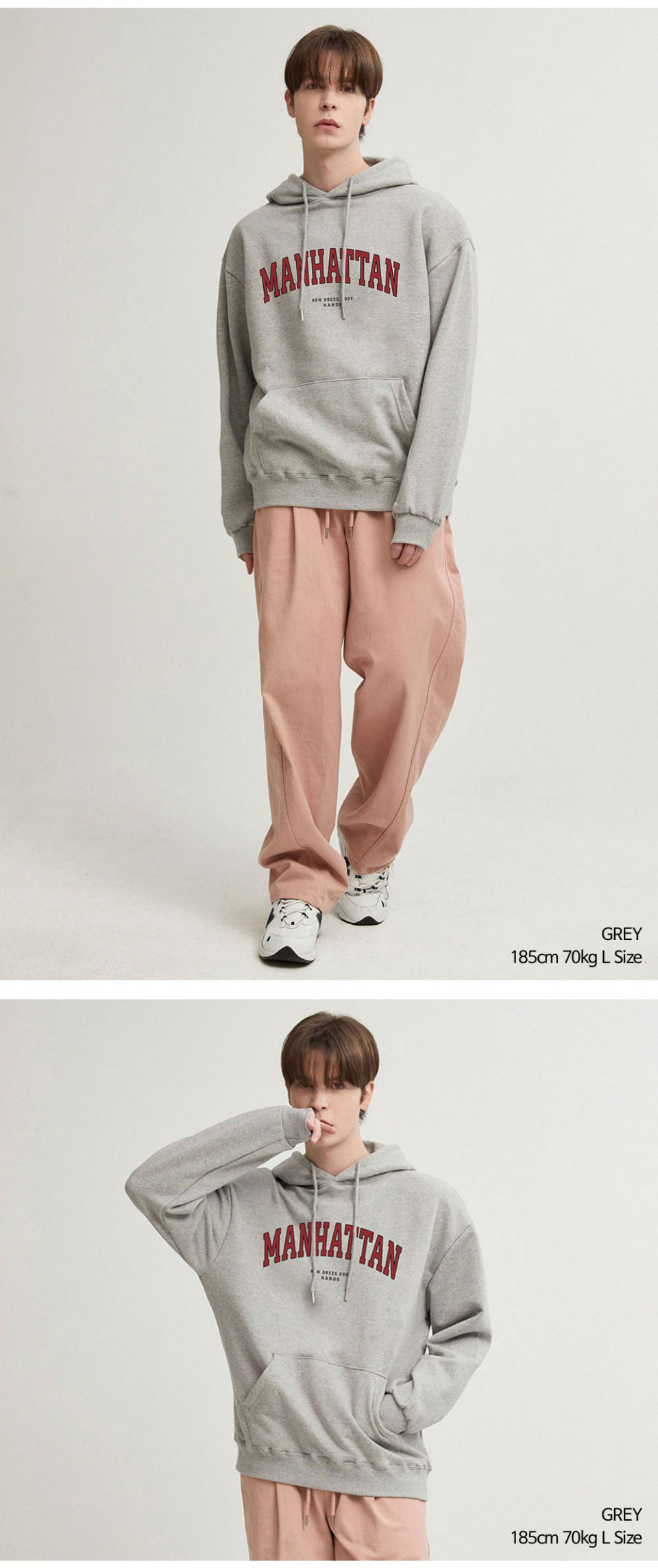 그레이색상 멘헤튼 글자가 옷 가슴부분에 찍혀있는 맨투맨을 입은 남자 사진 