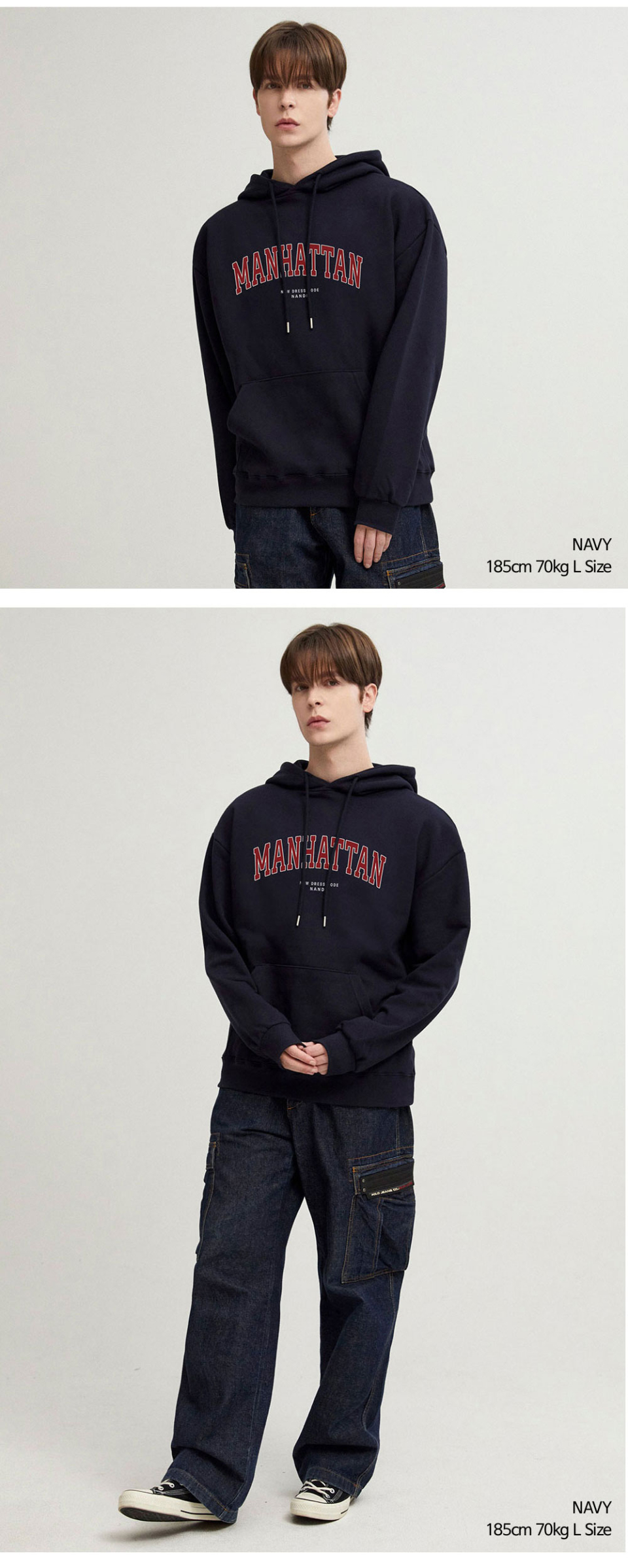 네이비색상 멘헤튼 글자가 옷 가슴부분에 찍혀있는 맨투맨을 입은 남자 사진 