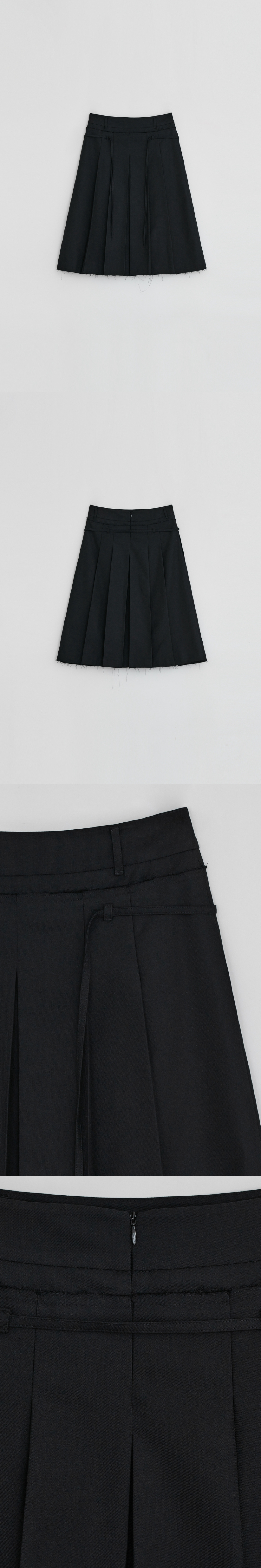 MUSINSA | DIAGONAL CUTTING PLEATS BELT SKIRT (black) MUSINSA | DIAGONAL CUTTING PLEATS BELT SKIRT (black)