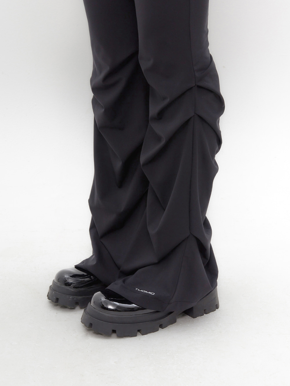 MUSINSA | TUOMIO STRAPPY SKIRT PANTS [BLACK]