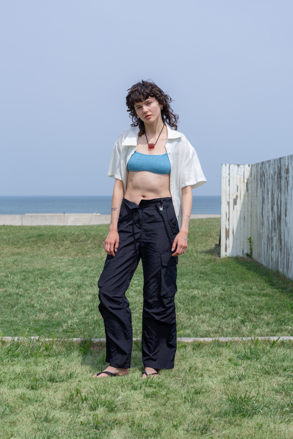 MUSINSA | MATIN KIM STRING NYLON CARGO PANTS IN BLACK
