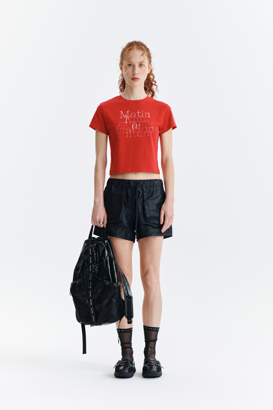 MUSINSA | MATIN KIM LOGO TAPING GLOSSY BACK PACK IN BLACK