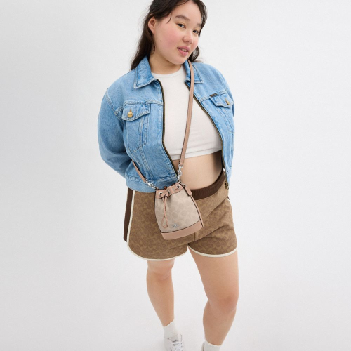 Mini Bucket Bag In Signature Canvas CW299 SVPWH