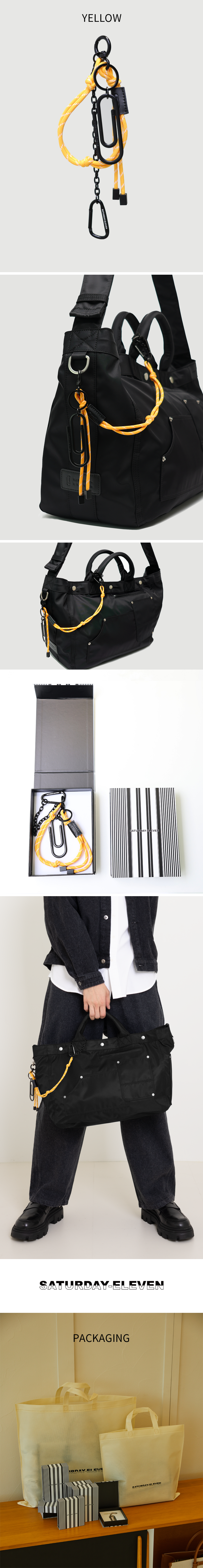 Workwear에서 영감을 받은 리벳, 스냅, 패치 포켓 디테일 일체형의 길이 조절이 가능한 넓은 어깨끈 토트, 크로스, 메신저 등 다양하게 착용할 수 있는 활용성 3가지 색상의 매듭 키링을 이용한 개성있는 연출 _ 유상 옵션