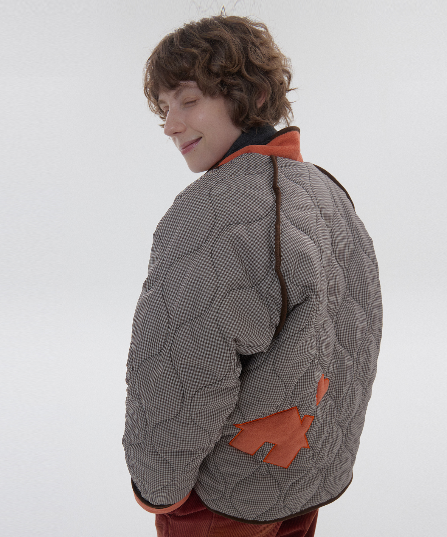 Fleece quilted reversible jumper_orange