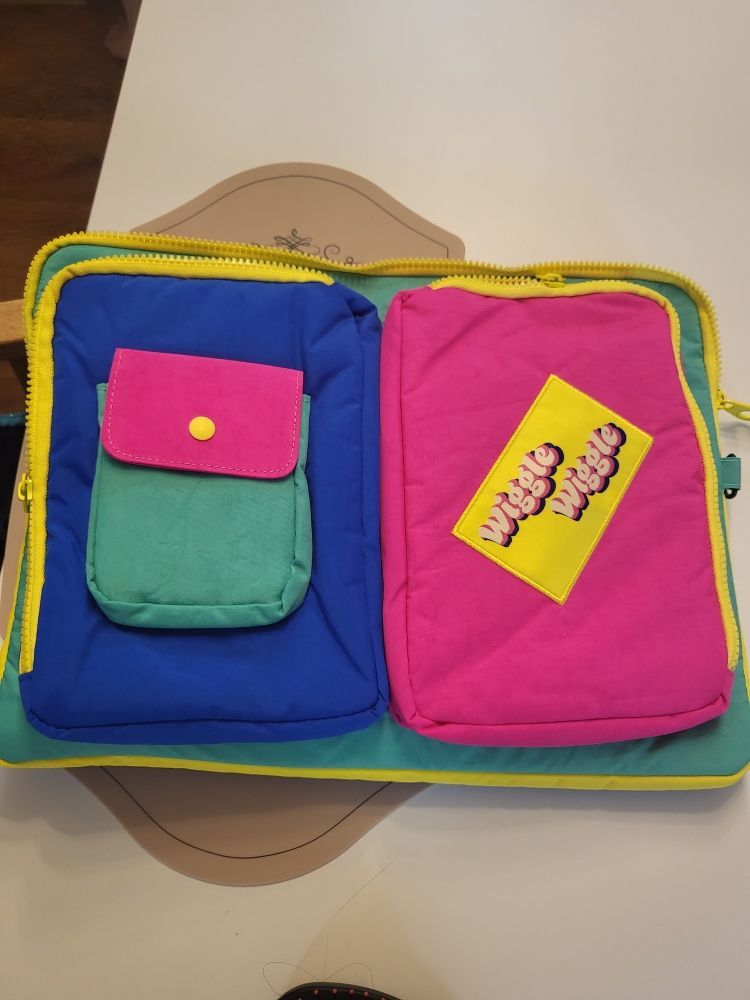 MUSINSA | WIGGLE WIGGLE Pocket Laptop Pouch - Green