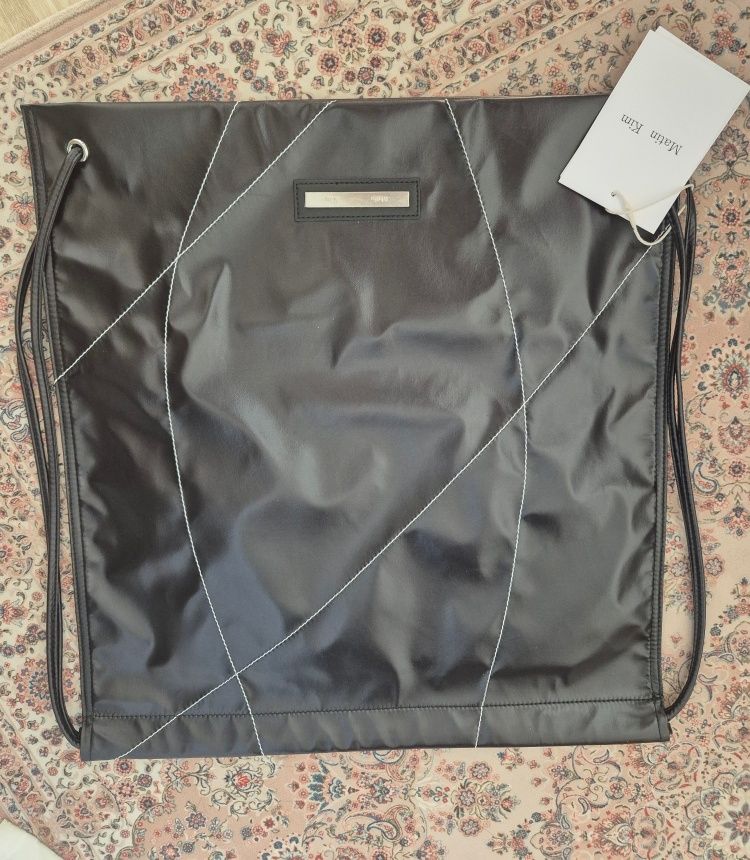 MUSINSA公式 | MATIN KIM STRING COATING BACK PACK IN BLACK