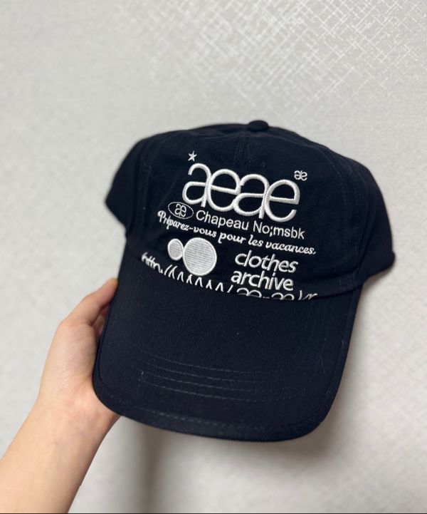 MUSINSA | AEAE WEB LOGO 5PANNEL CAP [BLACK]