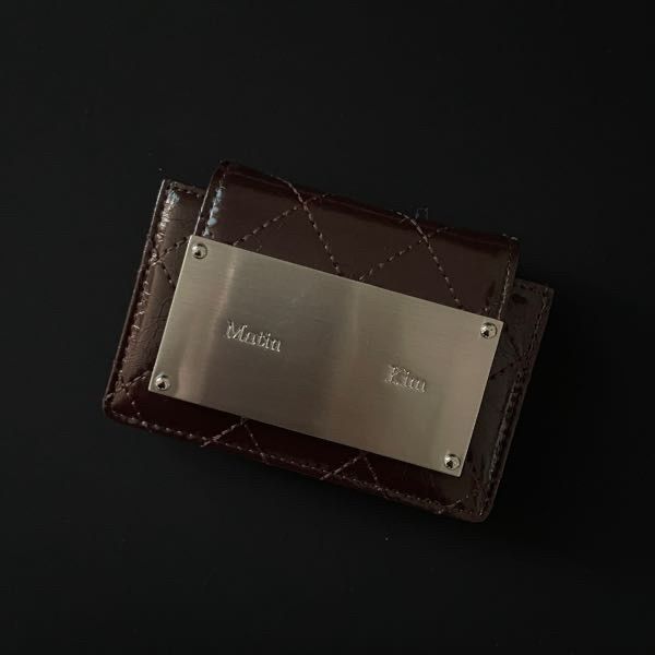 MUSINSA | MATIN KIM QUILTING ACCORDION WALLET IN DARK BROWN