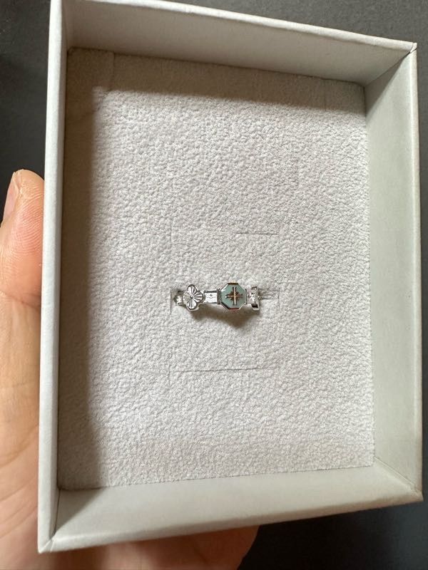 MUSINSA | MUSEE.ART Cross Angle Flower Miss Ring - Sky Blue